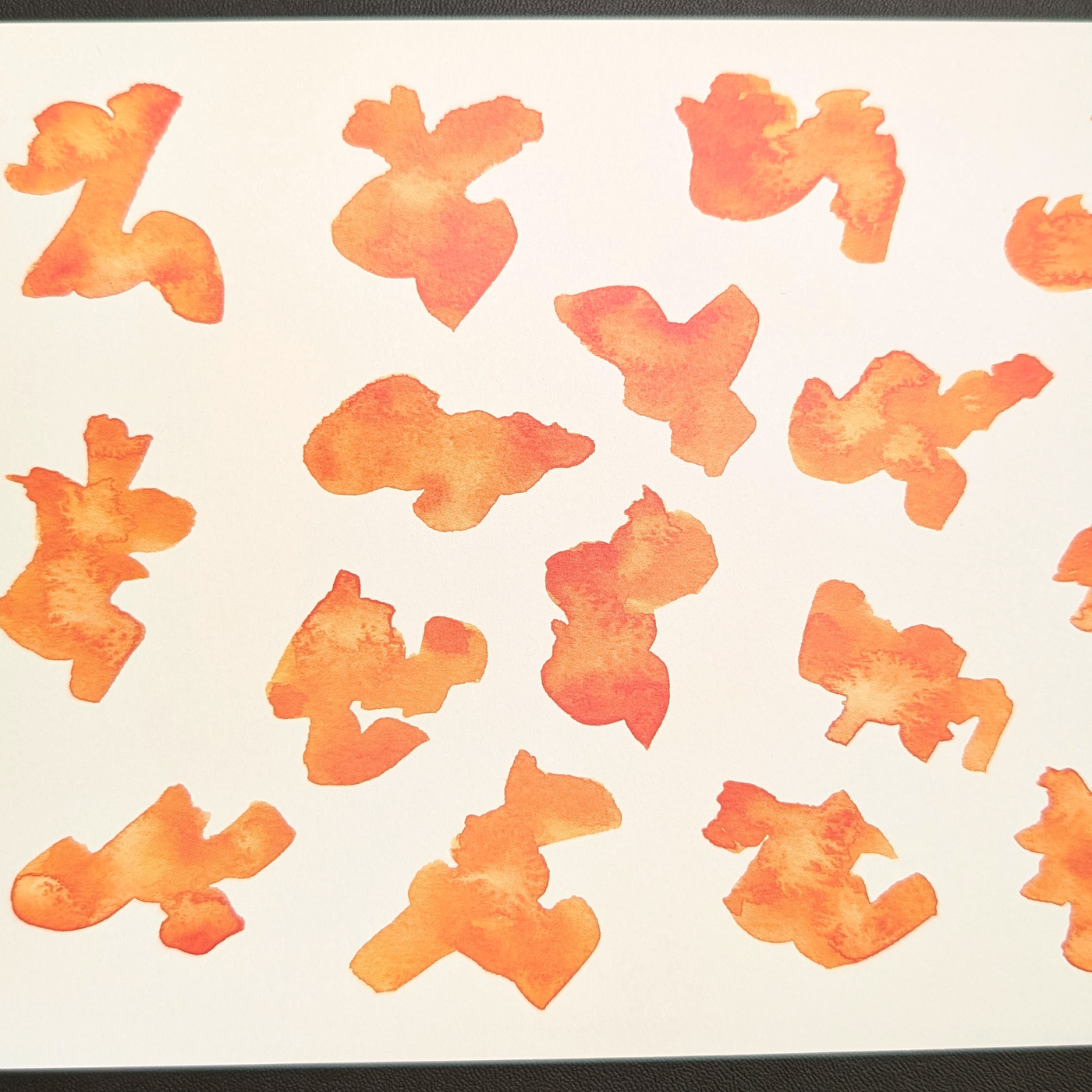An untouched orange watercolor card.