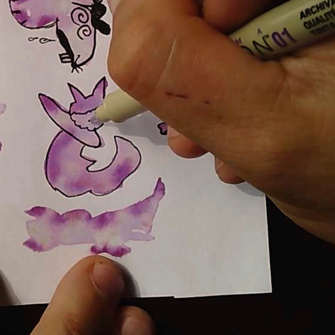 Fineliner details being added to the purple shape.